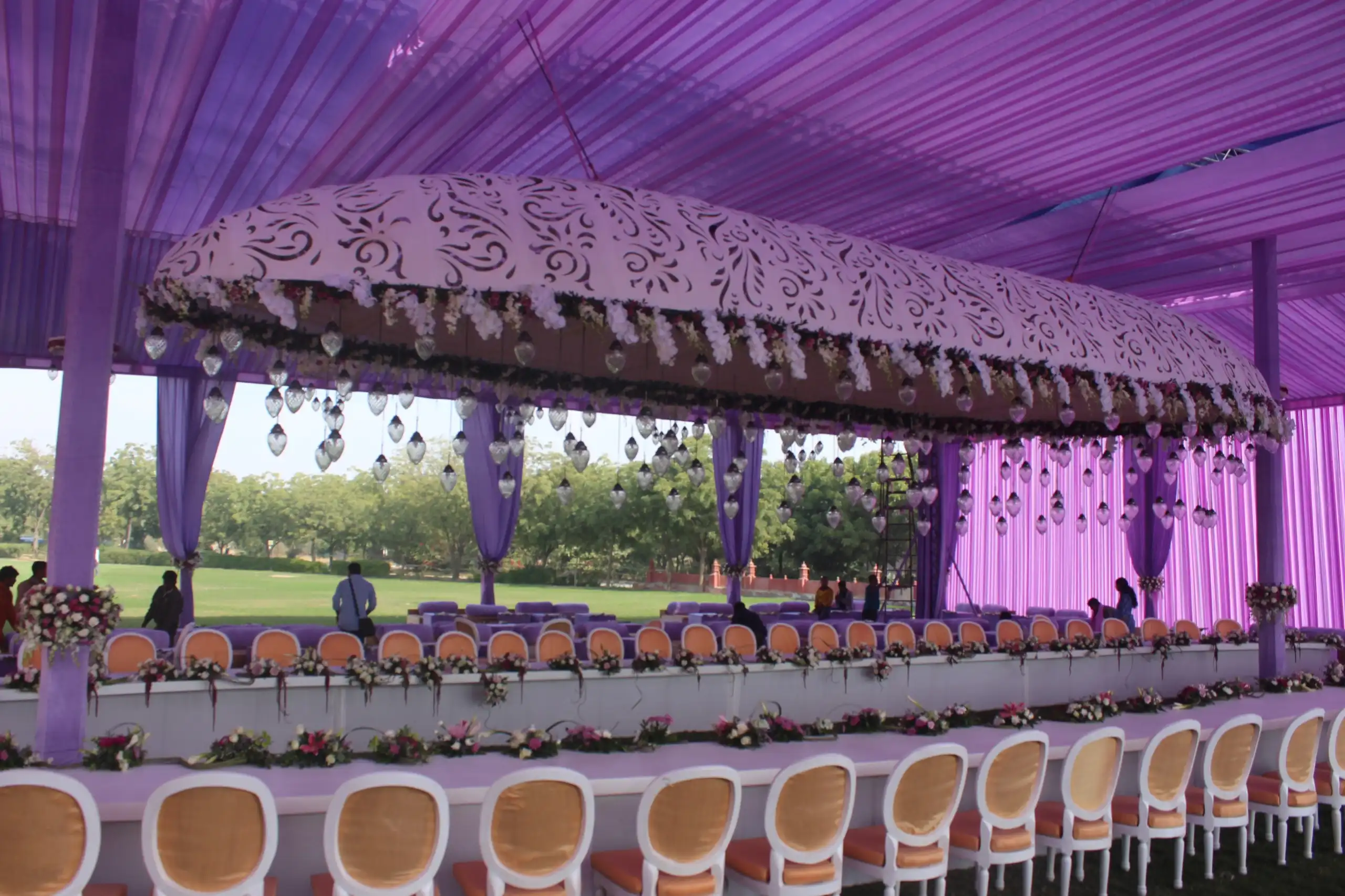 Round stage with floral arch