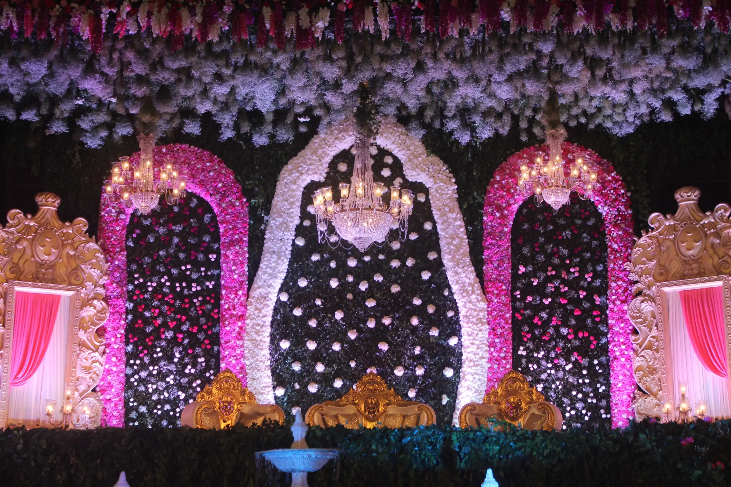Round stage with floral arch